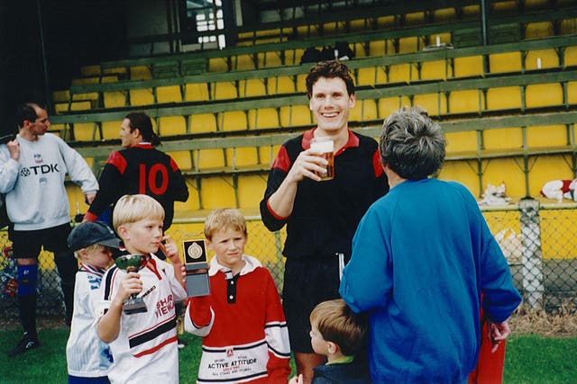 <p>A young Starmer pictured with his nieces and nephews </p>